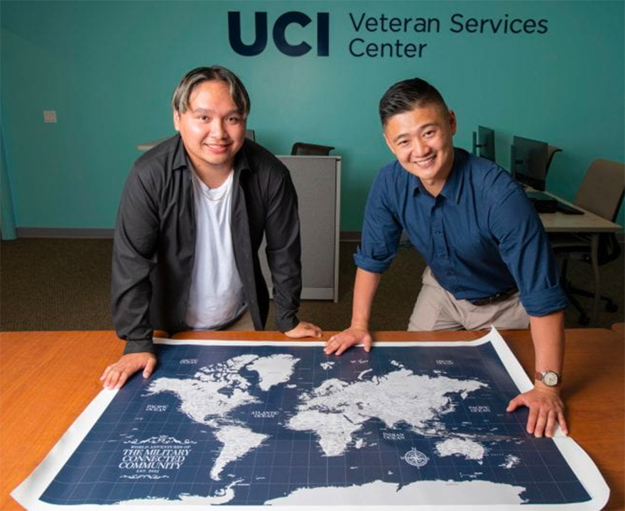 Emmanuel “David” Sangalang Delacruz (left) is a junior in philosophy and founder and president of UCI’s Military Connected Community. Here, he and Raymond Lim ’14 business economics, now a grad student in accounting and secretary of the MCC’s board, display the world map on which visitors to the campus’s Veteran Services Center are invited to pinpoint where they grew up and where they’ve been around the globe. Steve Zylius / UCI