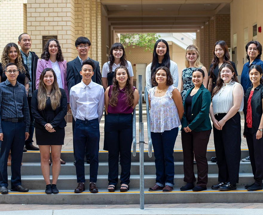 Valentina (back row, third from left in pink) presented her research findings at the 2022 Summer Academic Enrichment Program (SAEP) Symposium, courtesy of UCI School of Social Sciences. 