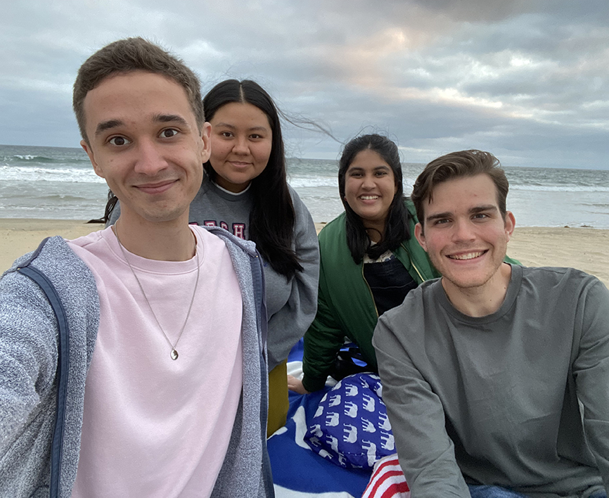 Jacob Sutherland with friends at the beach.